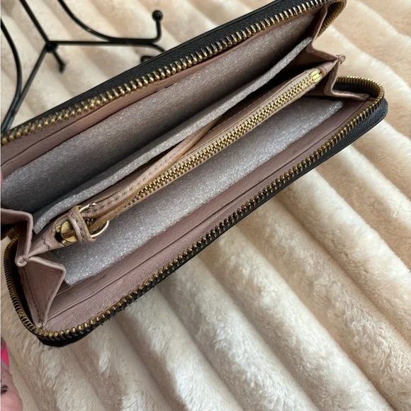 Sold.
Chloe Black Leather Wallet with Gold Bow Hardware. Refurbished - Picture 5 of 10